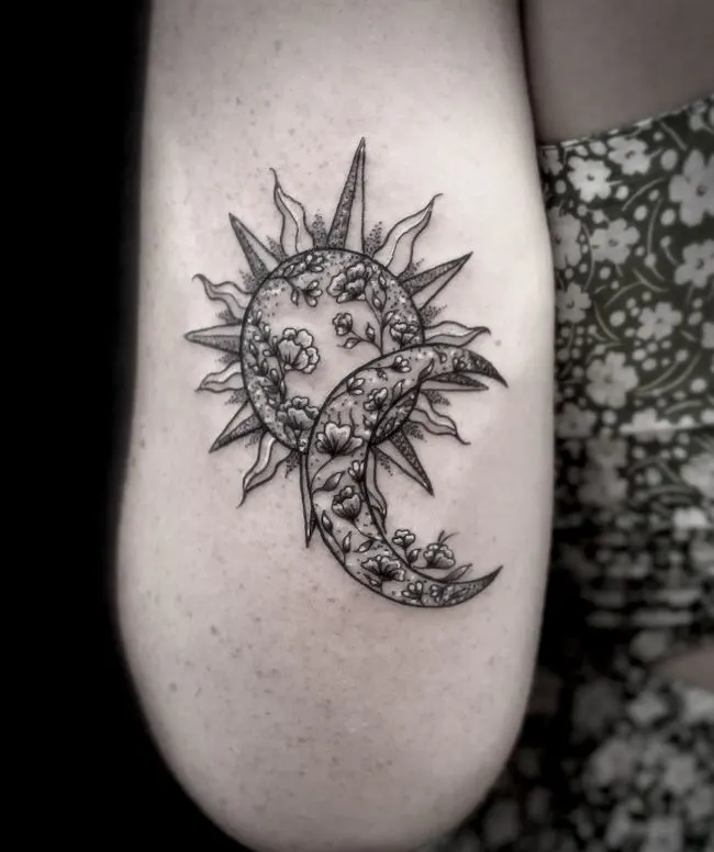 The overlapping sun and moon tattoo by @lishytattoo
