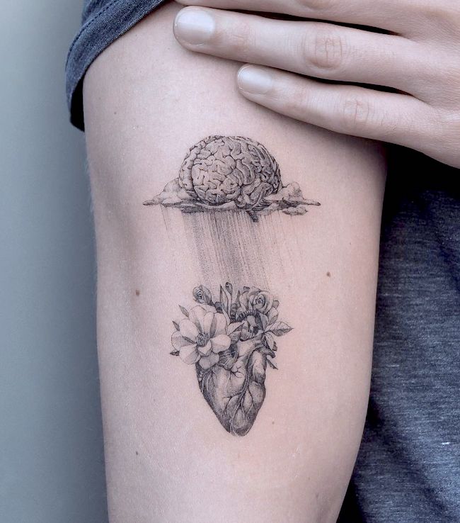 Trust your brain follow your heart a meaningful tattoo by @ghinkos