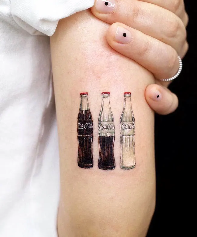 Coca cola tattoo by @soosoo.tattoo