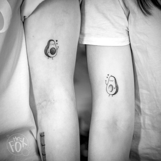 Matching avocado tattoo for friends by @mrs.fox_tattoo