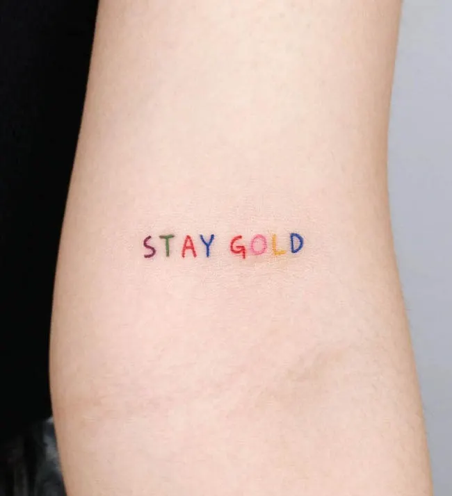 Stay gold _ short quote tattoo by @pureum_tattoo