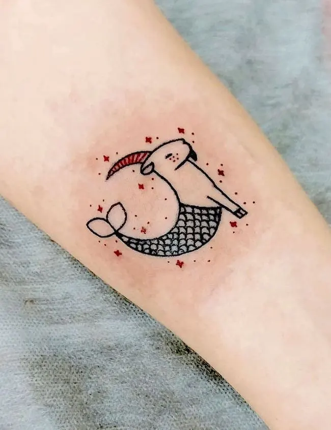 A simple and adorable Sea Goat tattoo for Capricorn by @inkottoo
