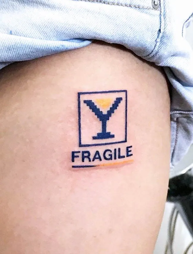 Fragile tattoo by @youthless