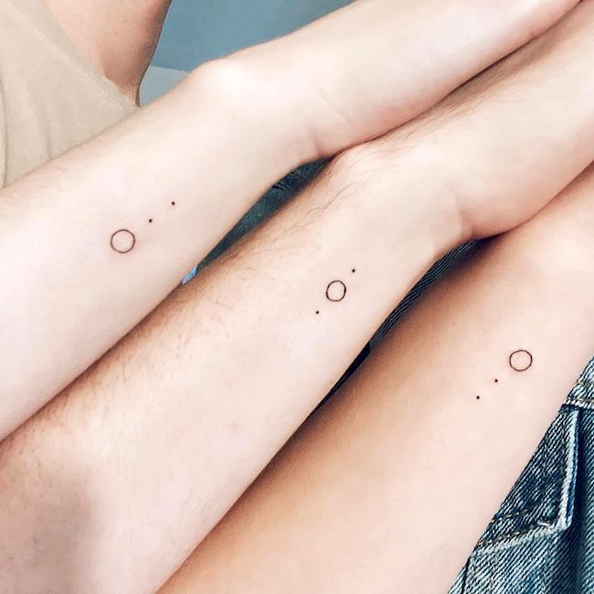Tiny matching siblings tattoos by @the_metanoian