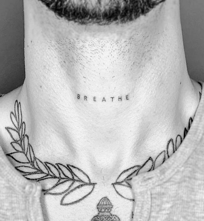Breathe_one word neck tattoo by @nillo.ink - small meaningful tattoos