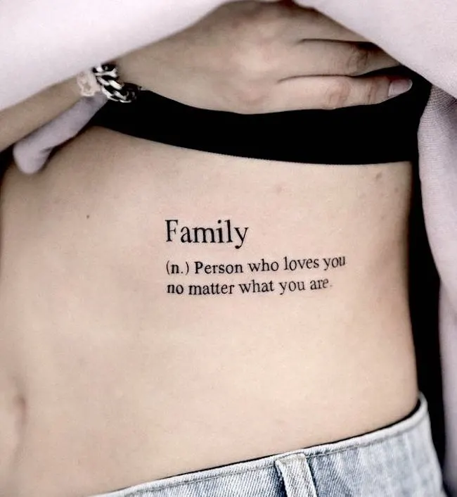 Heartwarming family quote tattoo by @boomzodat