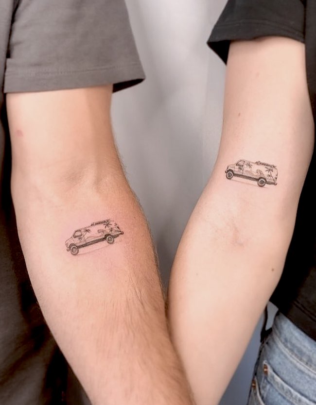 Matching van tattoos for traveler couple by @thepalmvan