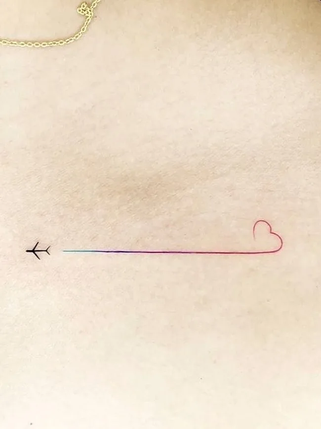 Minimalist plane tattoo by @bodycanvastattooart