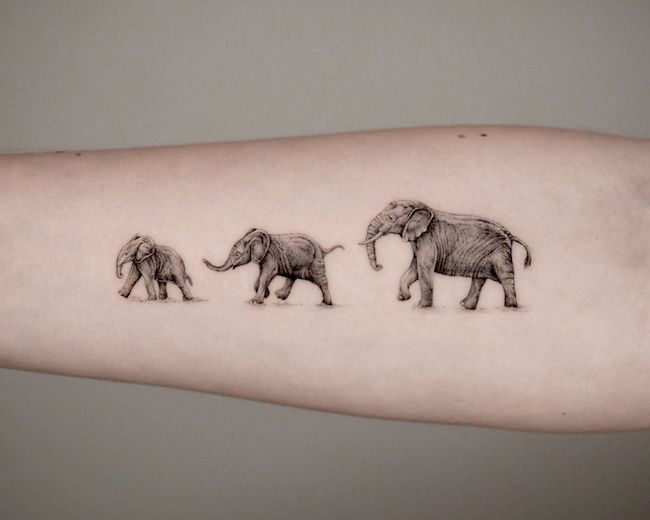 Mother and baby elephants tattoo by @philipppfohl