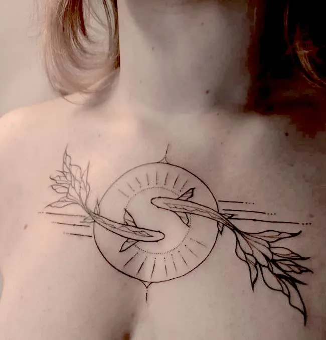 Pisces tattoo on the chest by @shari_tattooer