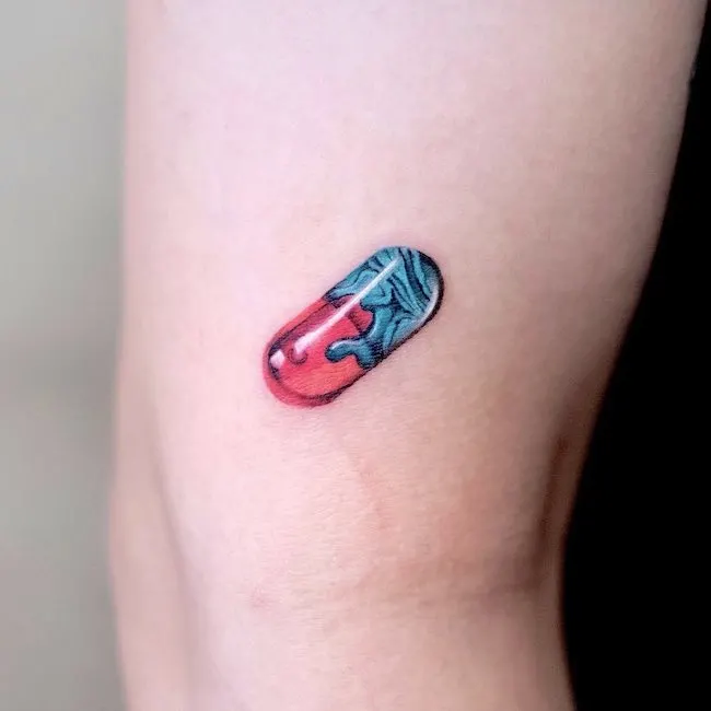 Red pill blue pill tattoo by @newtattoo_studio
