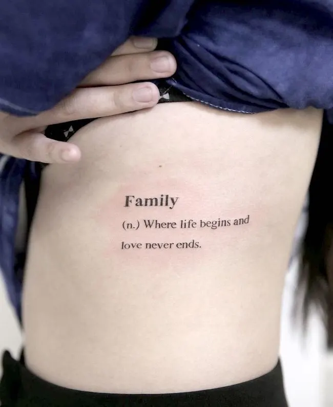 What is family quote tattoo by @boomzodat