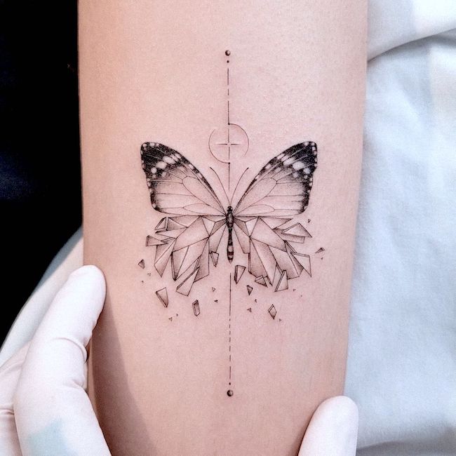 Broken in pieces butterfly tattoo by @dan_tattooer