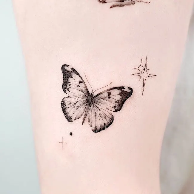 Butterfly and stars tattoo by @choiyun_tattoo