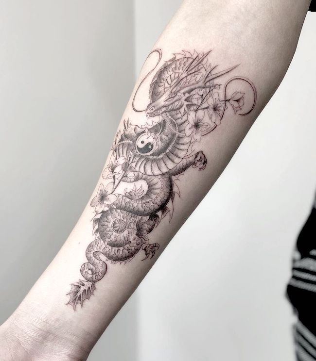 Dragon Yin Yang tattoo by @souljah.d- best dragon tattoos for women and girls