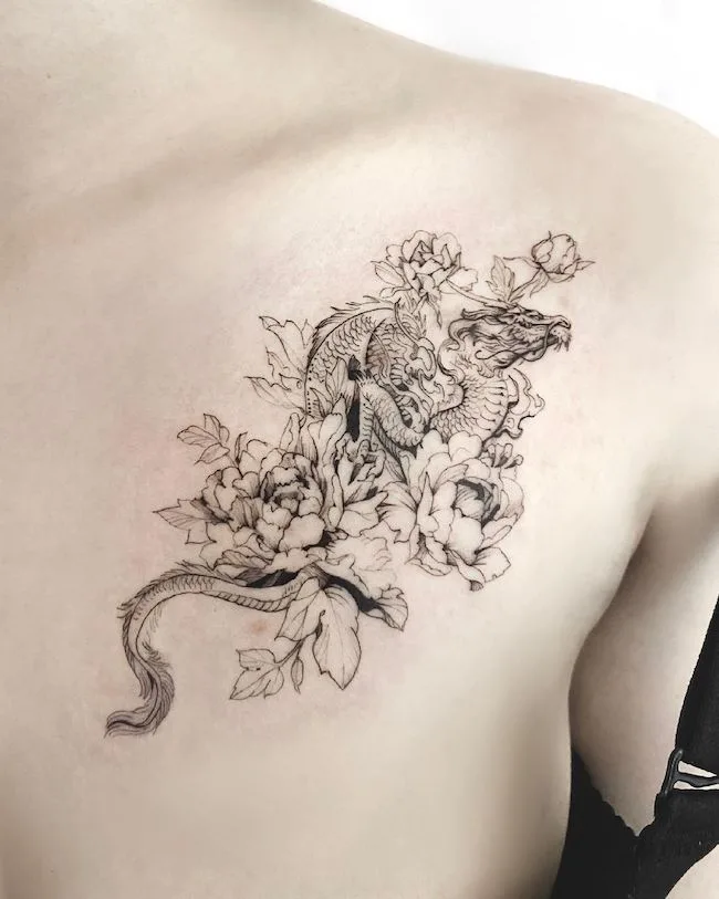 Back tattoo of Dragon and flowers  Red dragon tattoo Spirited away  tattoo Dragon tattoo for women