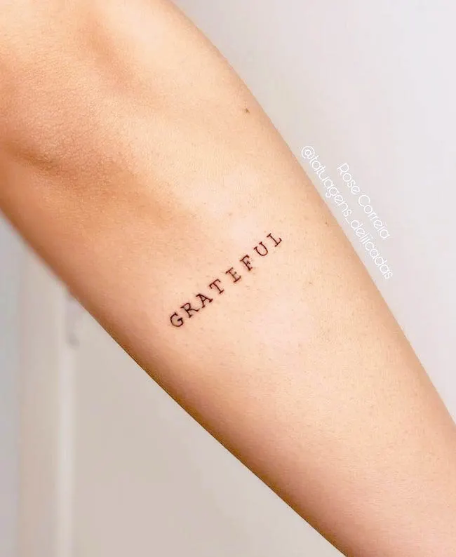 Grateful_meaningful one word tattoo by @tatuagens_deliicadas