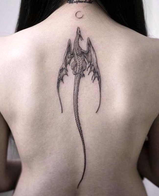 Moon and dragon tattoo on the back- best dragon tattoos for women and girls