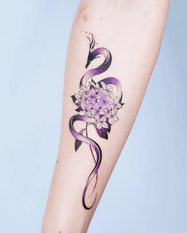 Purple floral dragon tattoo for girls by @e.nal .tattoo.jpg