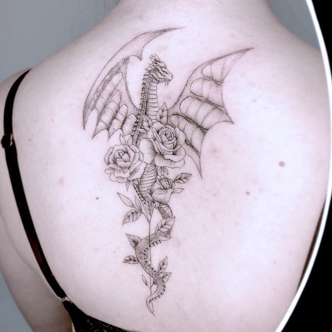 The meaning of the dragon and a rose tattoo is fiery passion Dragons are  known to be intense in the way that they are powerful and strong   Instagram