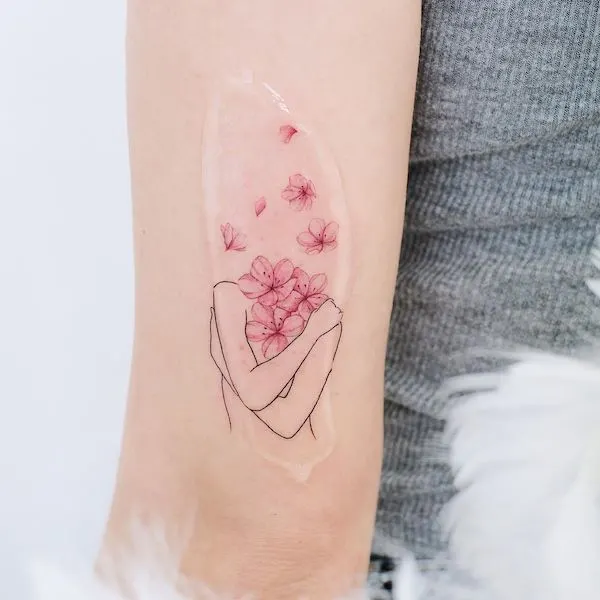 Cherry blossom abstract tattoo by @hktattoo_tina- Cherry blossom flower tattoos with meaning