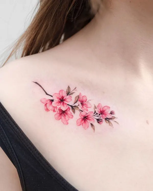 Cherry blossom collarbone tattoo by @donghwa_tattoo- Cherry blossom flower tattoos with meaning