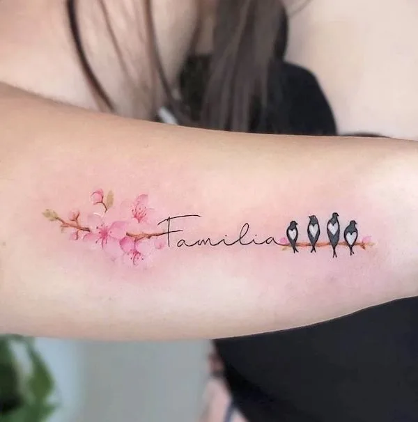 Cherry blossom family lettering tattoo by @soho_concept