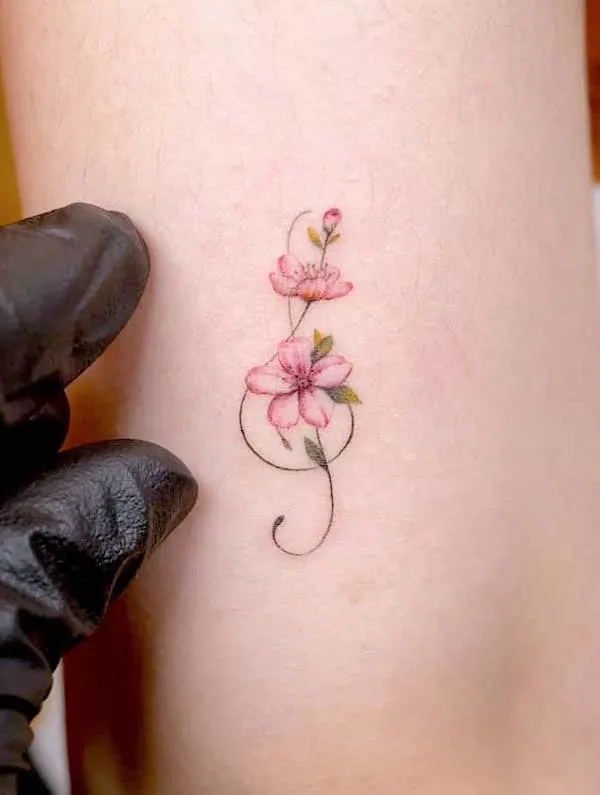Cherry blossom note tattoo for music lovers by @handitrip- Cherry blossom flower tattoos with meaning