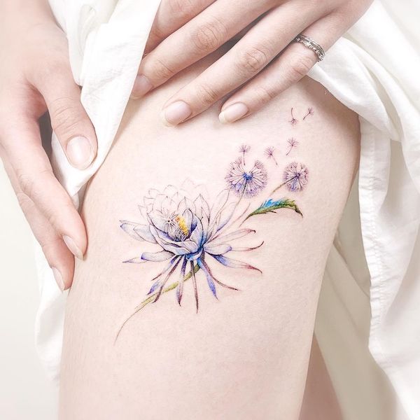 Dandelion and waterlily thigh tattoo by @lian.tattoo