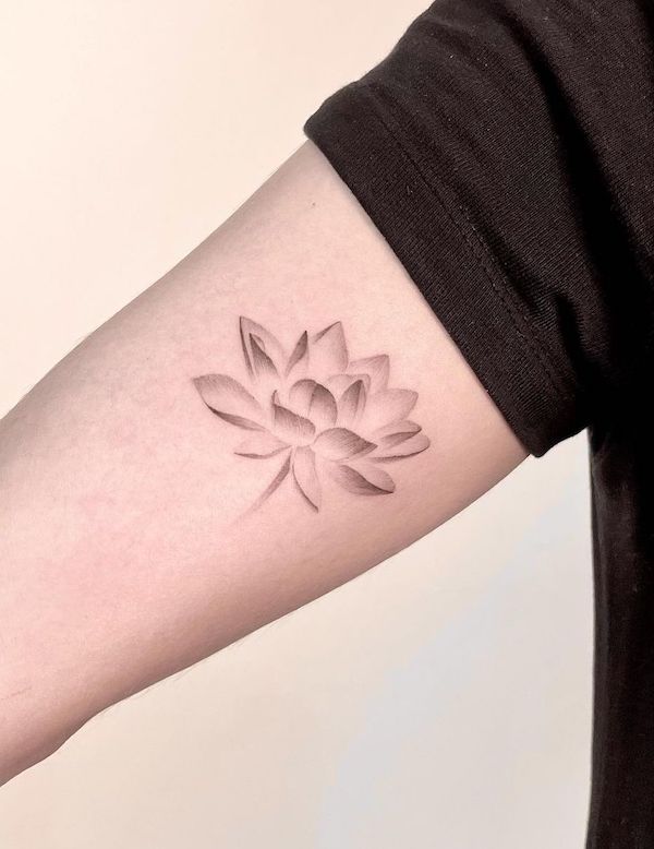 Black flower tattoo element design with leaves on sides. | CanStock