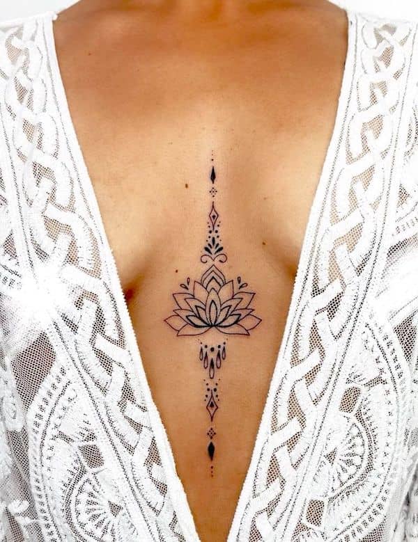 Lotus mandala chest tattoo by @anais_chabane