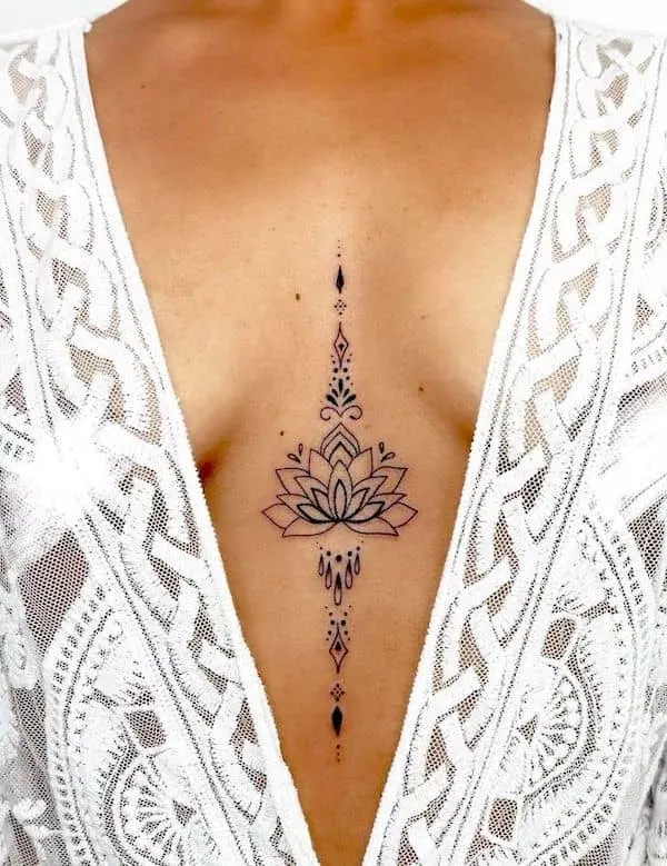 Lotus mandala chest tattoo by @anais_chabane