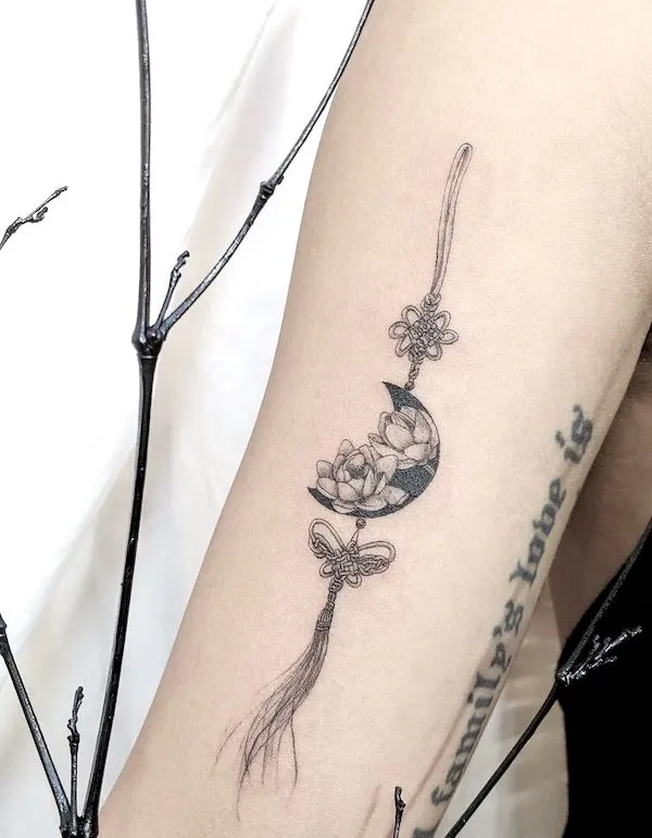Norigae waterlily moon tattoo by @heeyatattoo - Waterlily flower tattoos with meaning