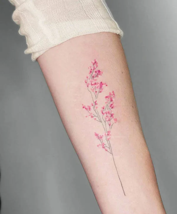 Pink wildflower tattoo by @eva_tattooist