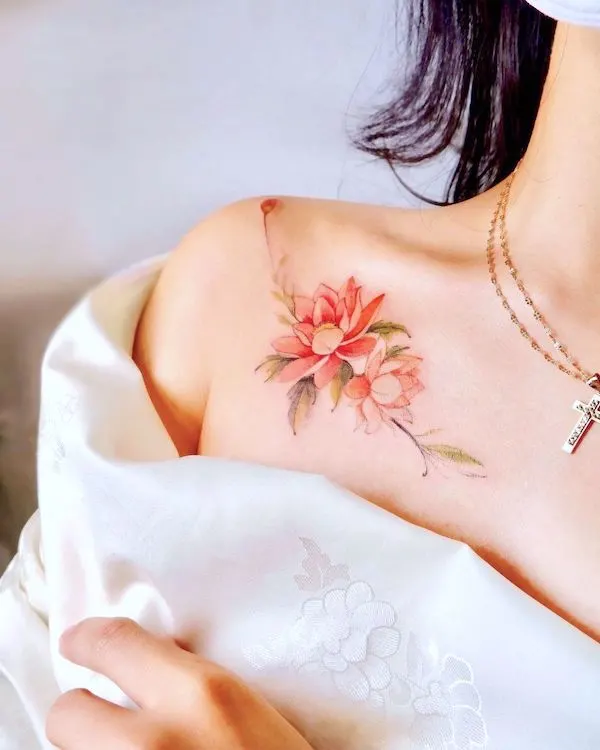 Red lotus shoulder tattoo by @seolheetattoo