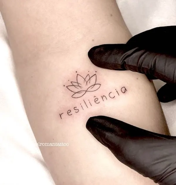 Resilient simple lotus tattoo by @raquelromantattoo