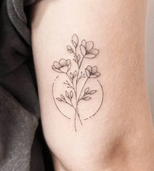 Simple wildflowers circle tattoo by @kristinevodon