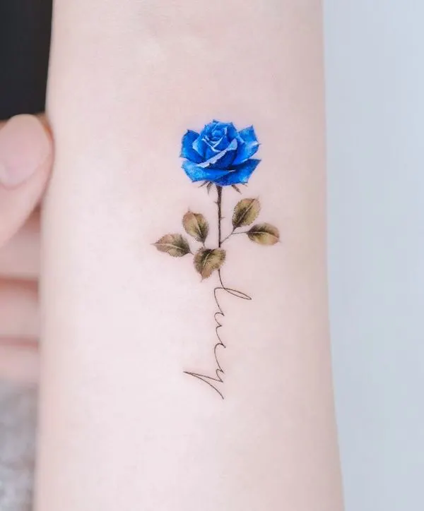 Stunning blue rose tattoo by @donghwa_tattoo - Rose tattoos with meaning