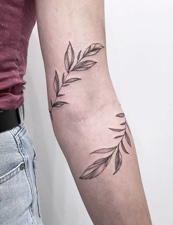 Vine tattoo on the arm by @parry.w.s