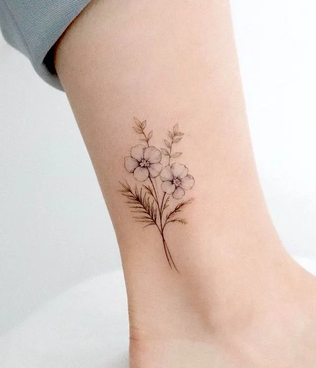White daisy ankle tattoo by @yezottt