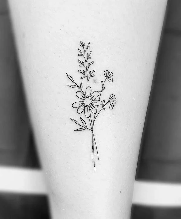 Wildflowers leg tattoo by @tattoosbyina