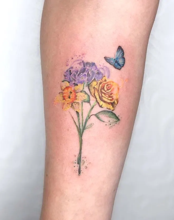 Butterfly and flowers tattoo by @hollyridingtattoo