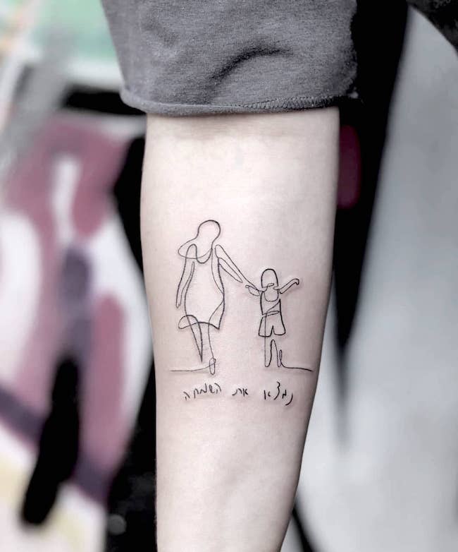Cute mother daughter arm tattoo by @inbal_tattoo