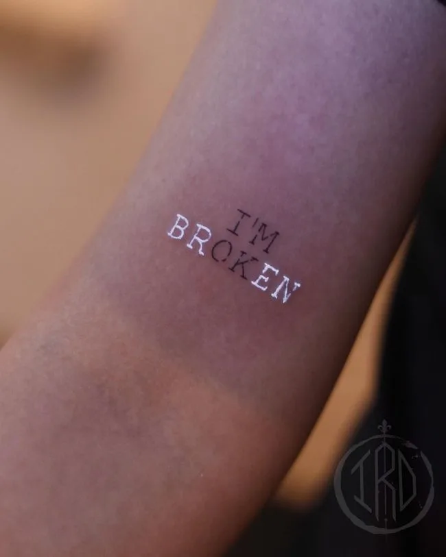 I am broken quote tattoo by @nhi.ink