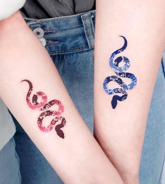 Matching snake forearm tattoos for best friends by @tattooinkspiration