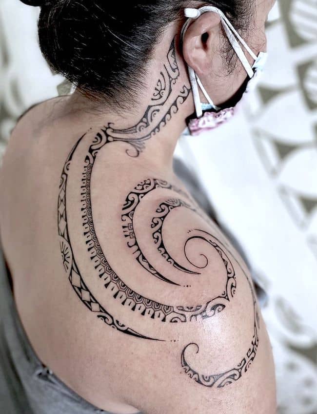 Swirl tribal shoulder tattoo for women by @d.russ_.tattoo