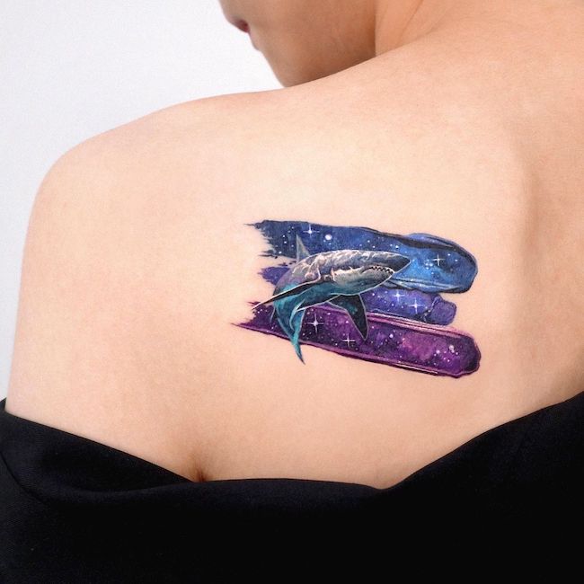 Shark in the starry night tattoo by @tattooist_sigak - Cute colored shoulder tattoos for women