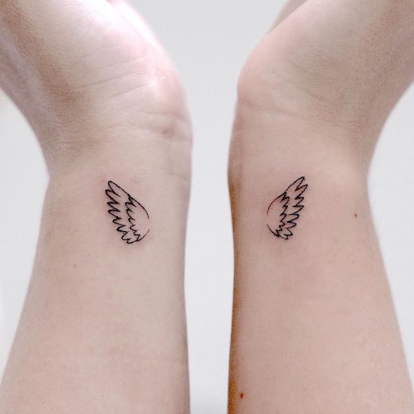 28 Elegant Angel Wings Tattoos On Wrists