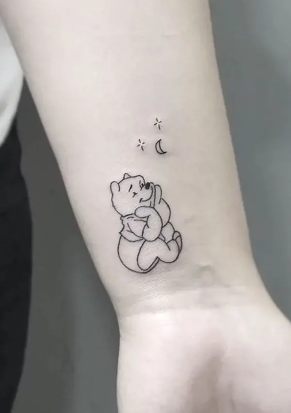Cute Winnie the Pooh wrist tattoo by @vrltattoo