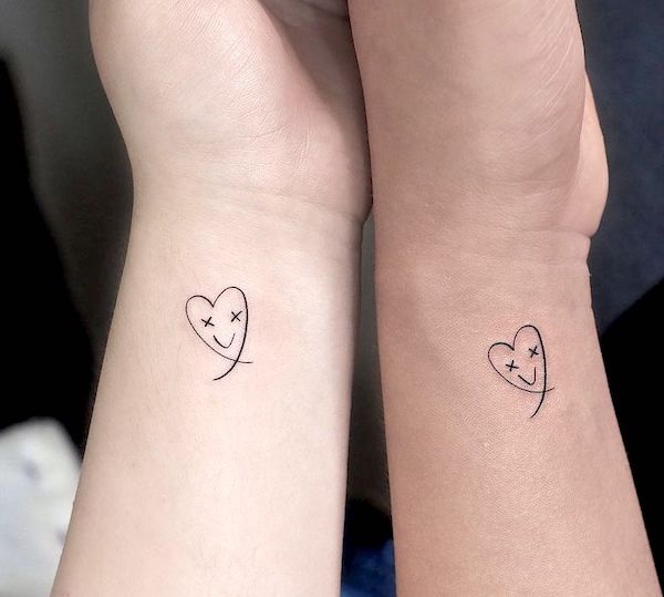 Cute small heart tattoos on the wrist by @yoyo__tattoo